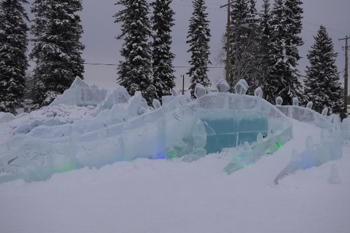 Beautiful Swan Lake ice sculpture by Jack Hackenwerth