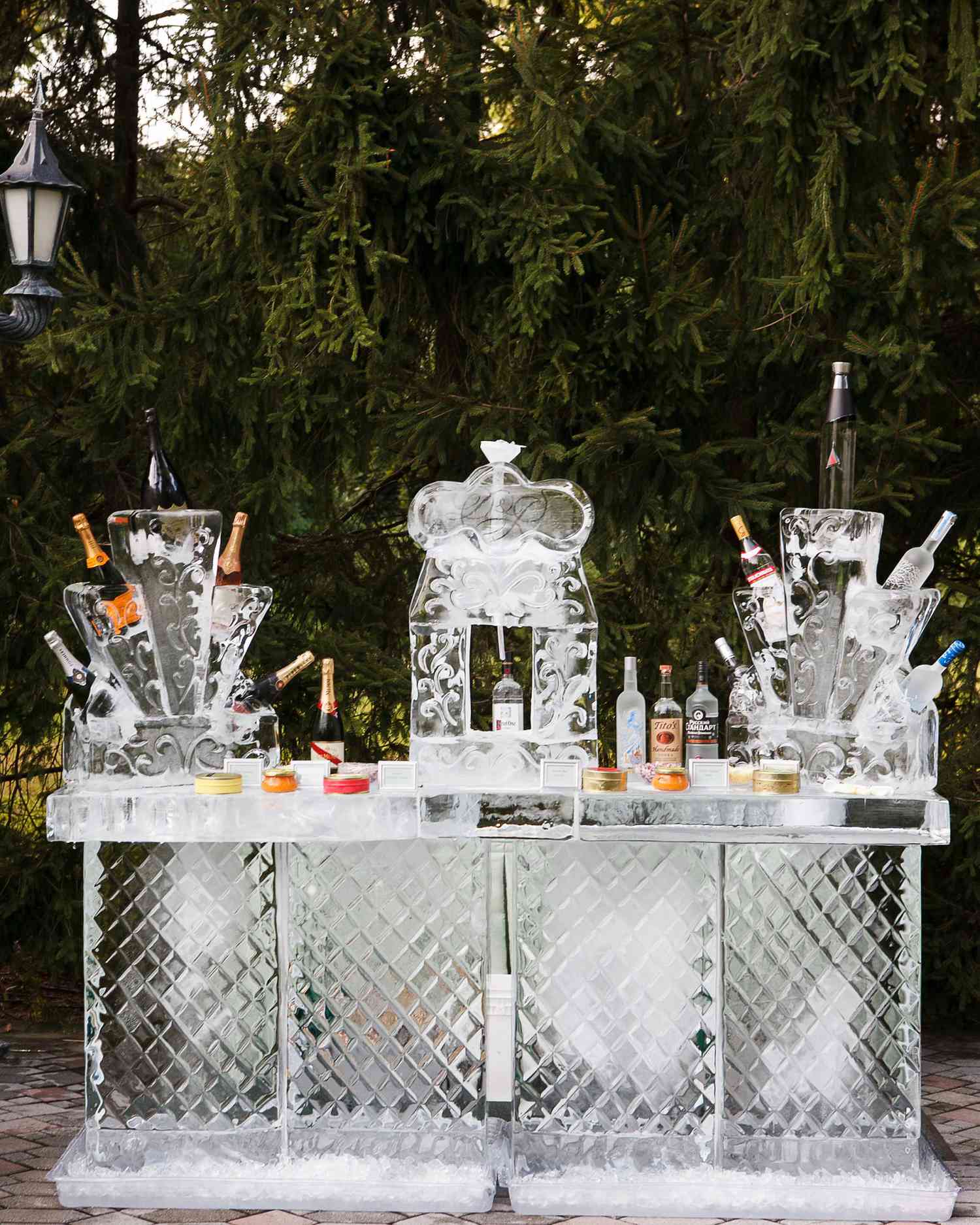 Intricate ice sculpture centerpiece at a wedding